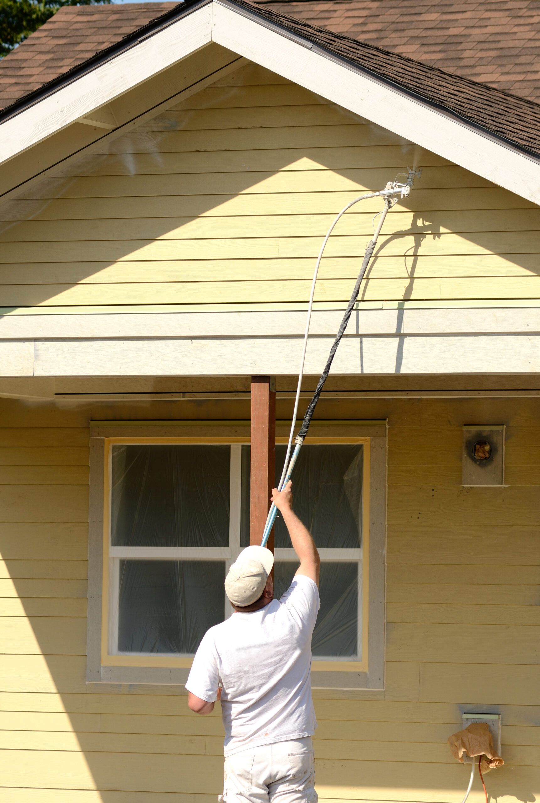 How To Spray Paint Your House's Exterior With An Airless Sprayer